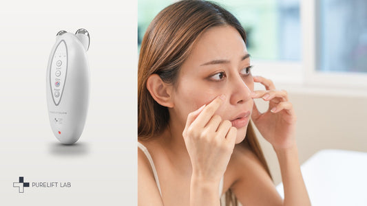 PureLift GLOW device beside a woman checking the skin under her eyes